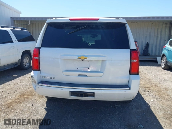 2016 Chevrolet Tahoe LTZ z VIN 1GNSKCKC8GR451685, wystawiony jako IAAI lot #42028917 z przebiegiem 73 398 mil mil oraz . Historia ofert i sprzedaży dostępna na DreamBid. Obrazek 16.