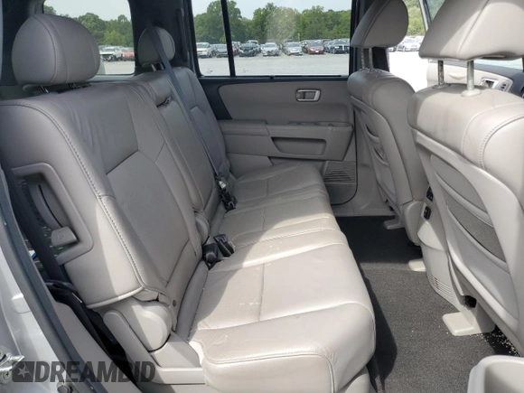 2010 Honda Pilot Touring with VIN 5FNYF3H82AB011212, listed as a Copart auction lot 71115874 with 248,495 mi miles and Salvage Title. Bid and sale history available at DreamBid. Image 11.