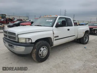 2001 Dodge Ram 3500 with VIN 1B7MC33771J257977, listed as a Copart auction lot 57947454 with 329,593 mi miles and Salvage Title. Bid and sale history available at carsss.com. Image 1.
