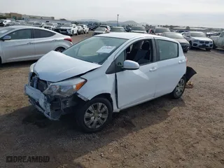 2014 Toyota Yaris L with VIN JTDKTUD31ED579222, listed as a IAAI auction lot 41398502 with 154,876 mi miles. Bid and sale history available at carsss.com. Image 17.