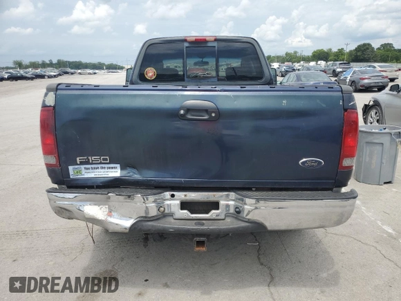 2003 Ford F-150 XL with VIN 2FTRX17L83CA53082, listed as a Copart auction lot 63836305 with 219,269 mi miles and Salvage title. Bid and sale history available at DreamBid. Image 6.