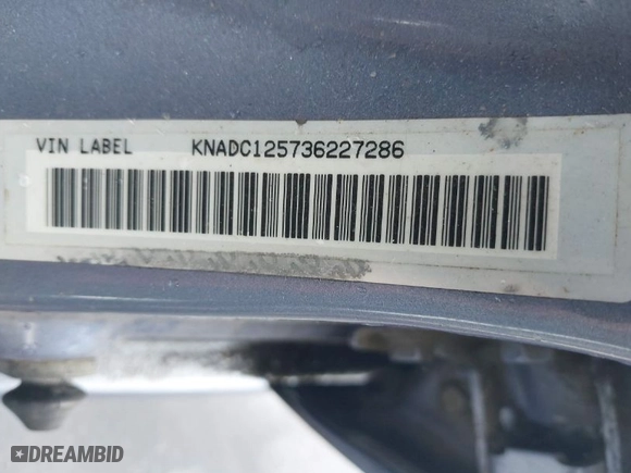 2003 Kia Rio with VIN KNADC125736227286, listed as a IAAI auction lot 41928174 with 151,431 mi miles. Bid and sale history available at carsss.com. Image 9.