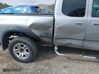 2002 Toyota Tundra SR5 with VIN 5TBRT34132S303771, listed as a IAAI auction lot 41633862 with 162,395 mi miles. Bid and sale history available at carsss.com. Image 6.