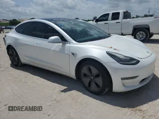 2019 Tesla Model 3 Long Range with VIN 5YJ3E1EB5KF418329, listed as a Copart auction lot 52183935 with 121,784 mi miles and Salvage Title. Bid and sale history available at DreamBid. Image 4.