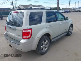 2008 Ford Escape Limited with VIN 1FMCU94138KC08118, listed as a IAAI auction lot 41843469 with 151,520 mi miles. Bid and sale history available at carsss.com. Image 4.
