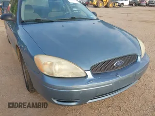 2006 Ford Taurus SE with VIN 1FAFP53U26A179541, listed as a IAAI auction lot 42000612 with 214,881 mi miles. Bid and sale history available at carsss.com. Image 12.