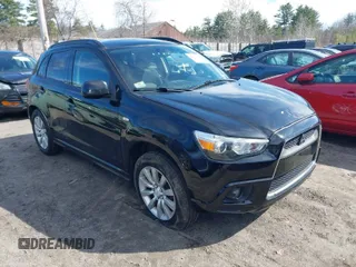 2011 Mitsubishi Outlander Sport SE with VIN JA4AR4AU5BZ017758, listed as a IAAI auction lot 42022031 with 121,888 mi miles. Bid and sale history available at carsss.com. Image 1.