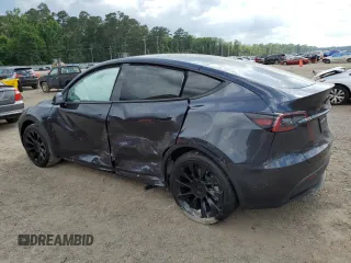 2024 Tesla Model Y Long Range z VIN 7SAYGAEE7RF123224, wystawiony jako Copart lot #58410545 z przebiegiem Nie podano mil oraz Szkoda całkowita • Salvage title. Historia ofert i sprzedaży dostępna na DreamBid. Obrazek 2.