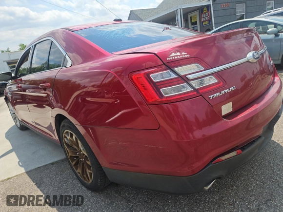 2013 Ford Taurus Limited with VIN 1FAHP2F88DG131171, listed as a Copart auction lot 60704625 with 175,016 mi miles and Clean title. Bid and sale history available at DreamBid. Image 3.