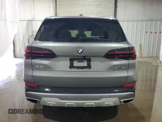 2024 BMW X5 xDrive40i z VIN 5UX23EU00R9U33915, wystawiony jako Copart lot #58737875 z przebiegiem Nie podano mil oraz Czysty tytuł • Clean title. Historia ofert i sprzedaży dostępna na DreamBid. Obrazek 6.