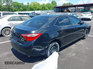 2019 Toyota Corolla L with VIN 5YFBURHE4KP860848, listed as a IAAI auction lot 42167529 with 152,301 mi miles. Bid and sale history available at carsss.com. Image 4.