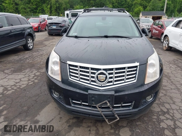 2013 Cadillac SRX Performance Collection z VIN 3GYFNHE39DS642111, wystawiony jako IAAI lot #42470291 z przebiegiem 176 239 mil mil oraz . Historia ofert i sprzedaży dostępna na DreamBid. Obrazek 6.