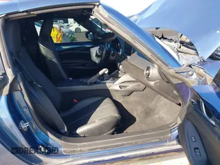 2020 Mazda MX-5 Miata Grand Touring z VIN JM1NDAM75L0412507, wystawiony jako IAAI lot #41573544 z przebiegiem Nie podano mil oraz . Historia ofert i sprzedaży dostępna na DreamBid. Obrazek 5.