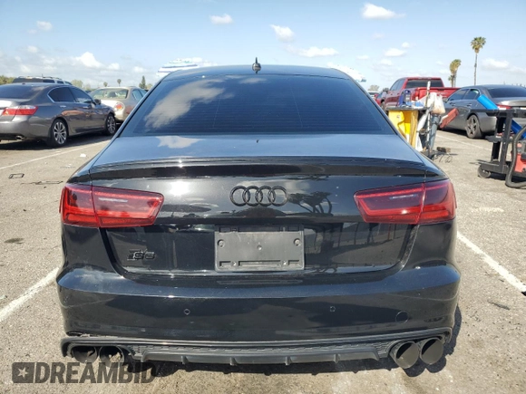 2018 Audi S6 Premium Plus z VIN WAUFFAFC5JN052662, wystawiony jako Copart lot #51669145 z przebiegiem Nie podano mil oraz Szkoda całkowita • Salvage title. Historia ofert i sprzedaży dostępna na DreamBid. Obrazek 6.