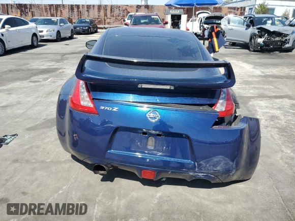 2016 Nissan 370Z z VIN JN1AZ4EH9GM933658, wystawiony jako Copart lot #48760215 z przebiegiem 70 682 mil mil oraz Szkoda całkowita • Salvage title. Historia ofert i sprzedaży dostępna na DreamBid. Obrazek 6.