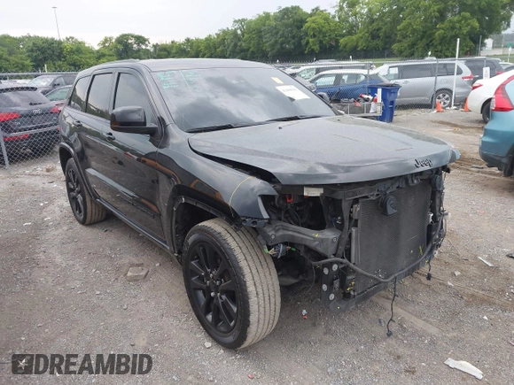 2020 Jeep Grand Cherokee Laredo E with VIN 1C4RJEAG7LC324904, listed as a IAAI auction lot 42600961 with 93,444 mi miles and . Bid and sale history available at DreamBid. Image 1.
