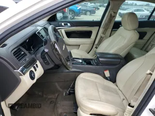 2013 Lincoln MKS EcoBoost with VIN 1LNHL9FT0DG607721, listed as a Copart auction lot 85129344 with 158,191 mi miles and Salvage title. Bid and sale history available at DreamBid. Image 7.
