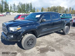 2016 Toyota Tacoma SR5 with VIN 5TFDZ5BN7GX001869, listed as a IAAI auction lot 40610002 with 184,380 mi miles. Bid and sale history available at carsss.com. Image 17.