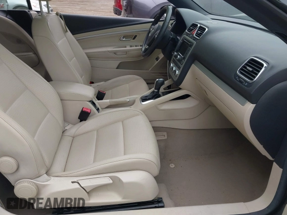 2014 Volkswagen Eos Komfort with VIN WVWBW8AH2EV001719, listed as a IAAI auction lot 42080290 with 105,661 mi miles and . Bid and sale history available at DreamBid. Image 5.