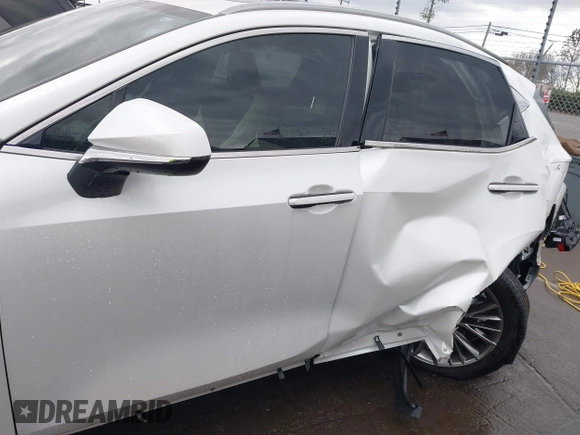 2023 Lexus NX 350h Premium with VIN JTJGKCEZ6P2011257, listed as a IAAI auction lot 41706179 with 4,917 mi miles and . Bid and sale history available at DreamBid. Image 14.