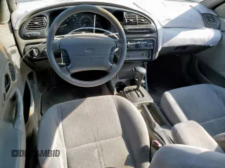 1999 Ford Contour LX with VIN 1FAFP66L2XK167281, listed as a Copart auction lot 64839335 with 256,227 mi miles and Clean title. Bid and sale history available at DreamBid. Image 9.
