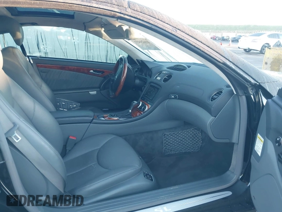 2006 Mercedes-Benz SL with VIN WDBSK76F66F113088, listed as a IAAI auction lot 41624451 with 21,116 mi miles and . Bid and sale history available at DreamBid. Image 5.