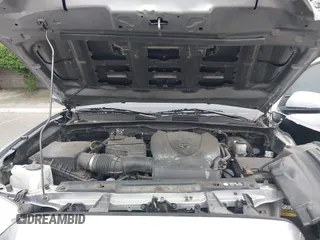 2016 Toyota Tacoma SR5 z VIN 3TMAZ5CN1GM014351, wystawiony jako IAAI lot #42357717 z przebiegiem 116 712 mil mil oraz . Historia ofert i sprzedaży dostępna na DreamBid. Obrazek 10.