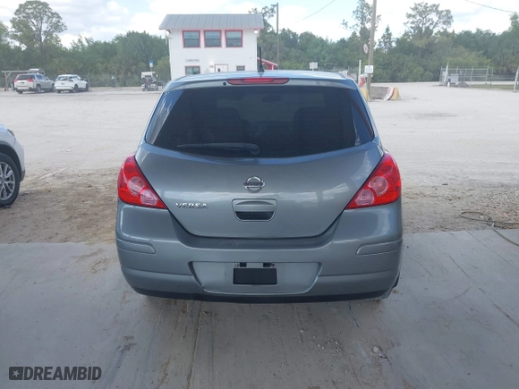 2011 Nissan Versa 1.8 SL with VIN 3N1BC1CP7BL446671, listed as a IAAI auction lot 42003858 with 96,939 mi miles. Bid and sale history available at carsss.com. Image 16.