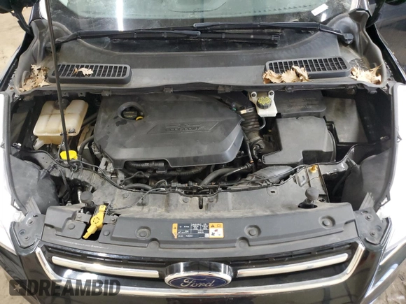 2015 Ford Escape Titanium with VIN 1FMCU9JX9FUA30970, listed as a Copart auction lot 41780275 with 106,114 mi miles and Salvage Title. Bid and sale history available at DreamBid. Image 12.