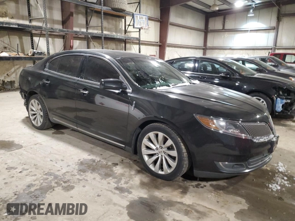 2013 Lincoln MKS with VIN 1LNHL9DK6DG606079, listed as a Copart auction lot 87322174 with 133,383 mi miles and Salvage Title. Bid and sale history available at DreamBid. Image 4.