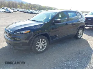 2014 Jeep Cherokee Sport with VIN 1C4PJLAB4EW110051, listed as a IAAI auction lot 41961698 with 153,570 mi miles and . Bid and sale history available at DreamBid. Image 2.
