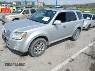 2008 Mercury Mariner Premier with VIN 4M2CU97198KJ12620, listed as a IAAI auction lot 41909389 with 131,884 mi miles and . Bid and sale history available at DreamBid. Image 2.