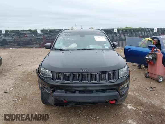 2019 Jeep Compass Trailhawk z VIN 3C4NJDDB5KT618149, wystawiony jako IAAI lot #41959320 z przebiegiem 99 795 mil mil oraz . Historia ofert i sprzedaży dostępna na DreamBid. Obrazek 12.