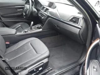 2015 BMW 3 Series 328i with VIN WBA3A5C59FF606236, listed as a IAAI auction lot 41690502 with 115,085 mi miles. Bid and sale history available at carsss.com. Image 5.
