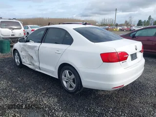 2013 Volkswagen Jetta TDI w/Premium with VIN 3VWLL7AJ2DM425448, listed as a IAAI auction lot 41806552 with 125,043 mi miles and . Bid and sale history available at DreamBid. Image 3.