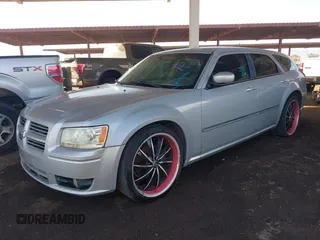 2008 Dodge Magnum SXT with VIN 2D4FV37V18H214391, listed as a IAAI auction lot 41608426 with 218,573 mi miles and . Bid and sale history available at carsss.com. Image 2.