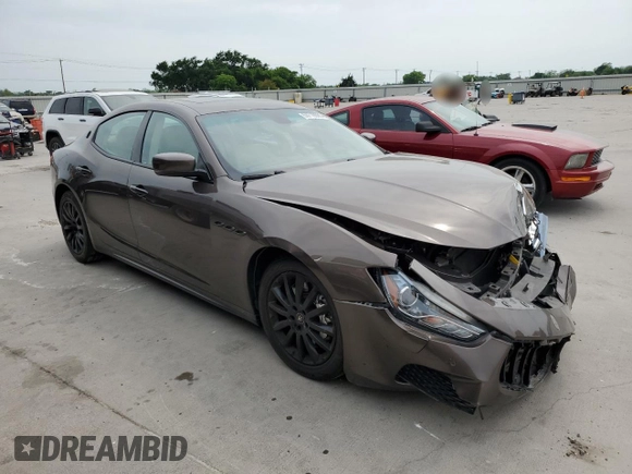 2014 Maserati Ghibli S Q4 with VIN ZAM57RTA6E1085708, listed as a Copart auction lot 53710095 with 110,799 mi miles and Salvage title. Bid and sale history available at DreamBid. Image 4.