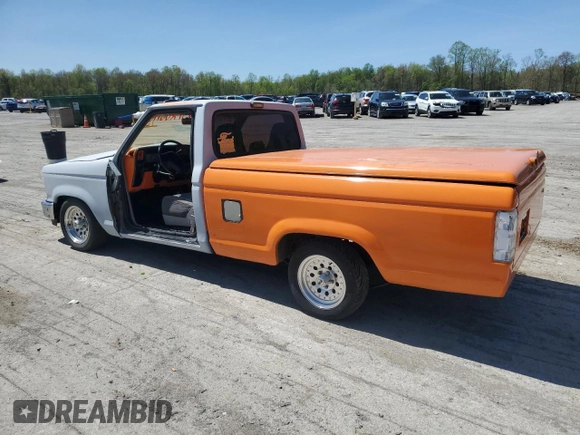 1992 Ford Ranger with VIN 1FTCR10AXNUC80706, listed as a Copart auction lot 55174895 with 87,000 mi miles and Salvage title. Bid and sale history available at DreamBid. Image 2.