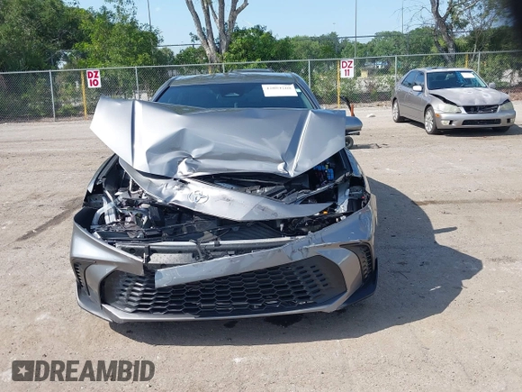 2025 Toyota Camry LE with VIN 4T1DAACK5SU539156, listed as a IAAI auction lot 42054268 with 5,705 mi miles and . Bid and sale history available at DreamBid. Image 13.