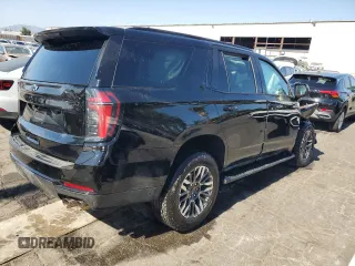 2025 Chevrolet Tahoe Z71 with VIN 1GNS6PRD8SR202788, listed as a Copart auction lot 63323005 with 14,824 mi miles and Clean title. Bid and sale history available at DreamBid. Image 3.