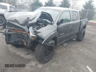 2012 Toyota Tacoma z VIN 3TMLU4EN9CM095110, wystawiony jako IAAI lot #41935207 z przebiegiem 177 543 mil mil oraz . Historia ofert i sprzedaży dostępna na DreamBid. Obrazek 2.
