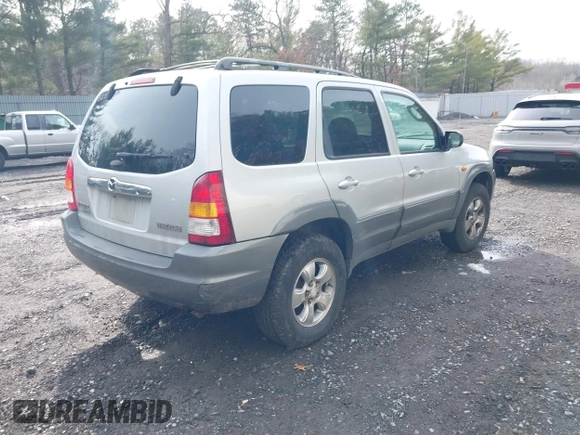2001 Mazda Tribute LX with VIN 4F2YU08151KM06561, listed as a IAAI auction lot 41478779 with 54,826 mi miles and . Bid and sale history available at DreamBid. Image 4.