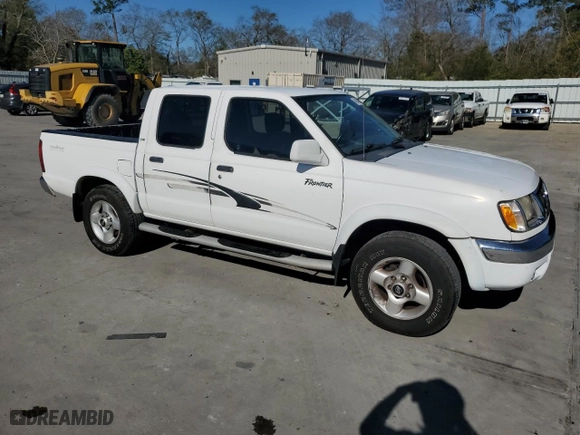 2000 Nissan Frontier 2WD XE with VIN 1N6ED27T1YC371438, listed as a Copart auction lot 49848805 with 216,527 mi miles and Salvage Title. Bid and sale history available at carsss.com. Image 4.