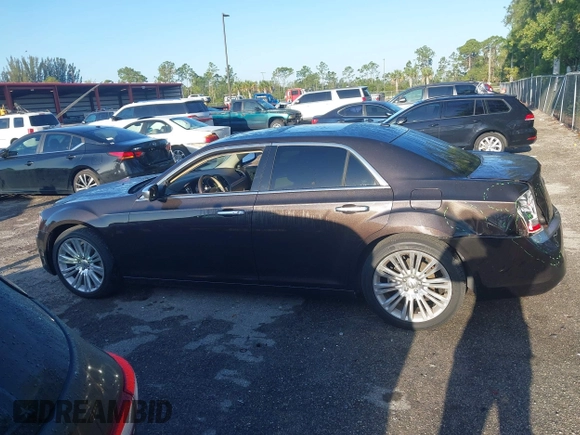 2012 Chrysler 300 C Luxury Series with VIN 2C3CCAPT3CH251755, listed as a IAAI auction lot 41935653 with 62,397 mi miles and . Bid and sale history available at carsss.com. Image 15.