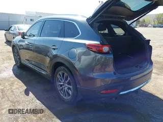 2020 Mazda CX-9 Signature with VIN JM3TCBEY9L0407955, listed as a IAAI auction lot 41984360 with 85,668 mi miles and . Bid and sale history available at carsss.com. Image 3.