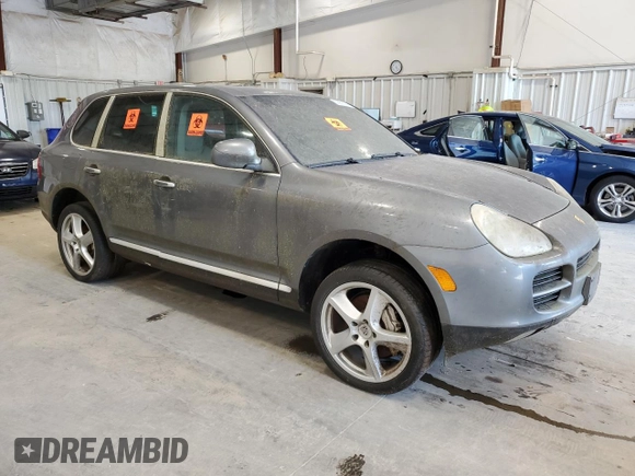 2004 Porsche Cayenne S with VIN WP1AB29P24LA69737, listed as a Copart auction lot 59908245 with Not provided miles and Clean title. Bid and sale history available at DreamBid. Image 4.
