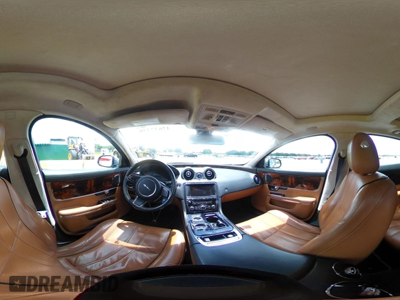2013 Jaguar XJ with VIN SAJWJ1CD4D8V46305, listed as a IAAI auction lot 42637329 with 101,532 mi miles and . Bid and sale history available at DreamBid. Image 21.