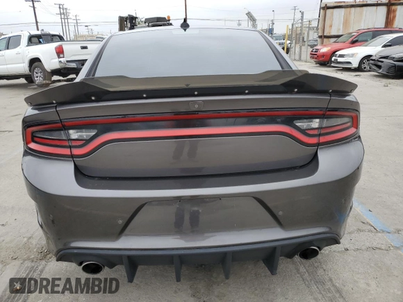 2020 Dodge Charger R/T z VIN 2C3CDXCTXLH183542, wystawiony jako Copart lot #58858325 z przebiegiem 52 999 mil mil oraz Szkoda całkowita • Salvage title. Historia ofert i sprzedaży dostępna na DreamBid. Obrazek 6.