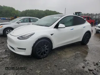 2021 Tesla Model Y Long Range z VIN 5YJYGDEE6MF068126, wystawiony jako Copart lot #56907045 z przebiegiem 29 444 mil mil oraz Szkoda całkowita • Salvage title. Historia ofert i sprzedaży dostępna na DreamBid. Obrazek 1.