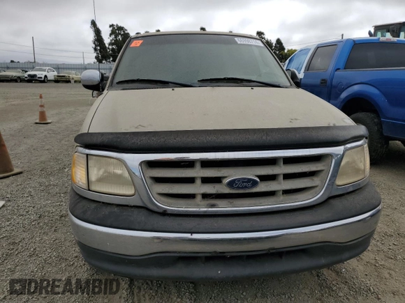2000 Ford F-150 XL with VIN 1FTRX17L3YKB07018, listed as a Copart auction lot 66998714 with 0 mi miles and Salvage Title. Bid and sale history available at carsss.com. Image 5.